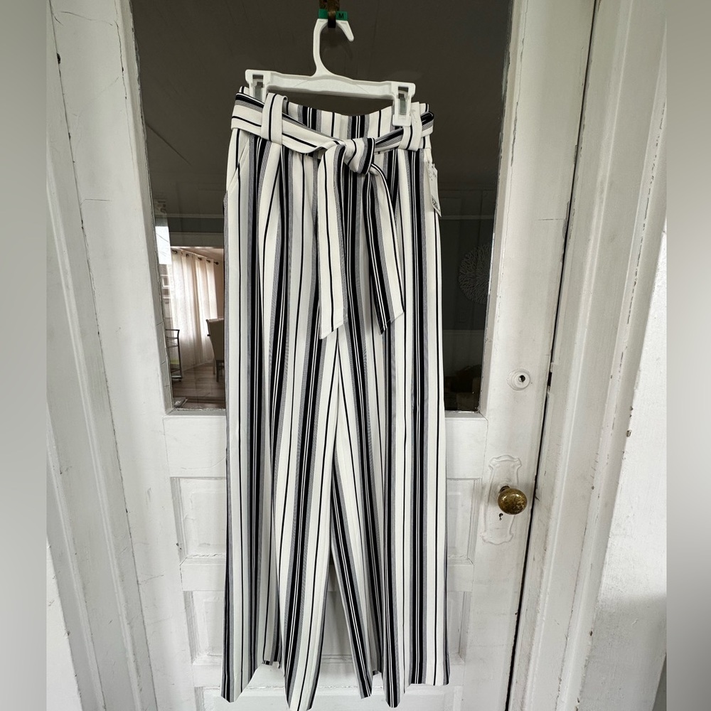 Navy and white striped flare pants with tie belt